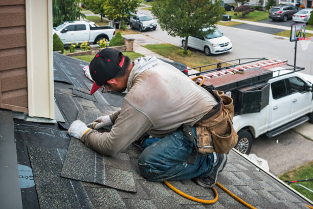 Professional Emergency Roof Repair technician working in Grassflat, PA